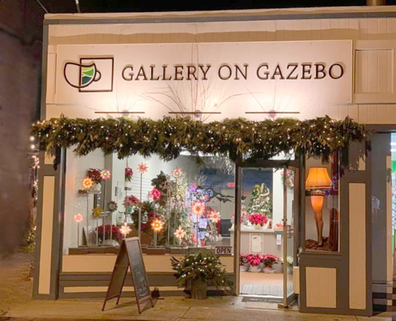Gallery on Gazebo Exterior with Leg Lamp in Window